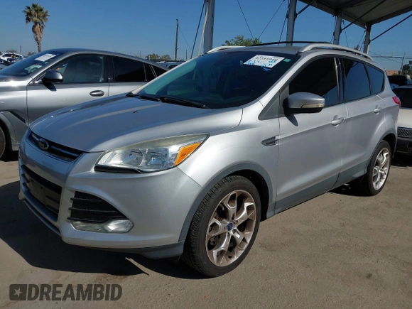 2015 Ford Escape Titanium with VIN 1FMCU0J90FUA43720, listed as a IAAI auction lot 42541048 with 98,948 mi miles and . Bid and sale history available at DreamBid. Image 17.