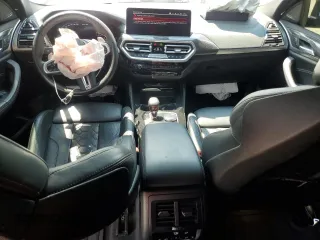 2022 BMW X4 M z VIN 5YM23EC02N9K87490, wystawiony jako Copart lot #65907114 z przebiegiem 55 555 mil mil oraz Szkoda całkowita • Salvage title. Historia ofert i sprzedaży dostępna na DreamBid. Obrazek 8.