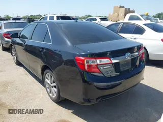 2014 Toyota Camry L with VIN 4T4BF1FK3ER413537, listed as a IAAI auction lot 42015577 with 181,592 mi miles. Bid and sale history available at carsss.com. Image 3.