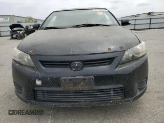 2012 Scion tC z VIN JTKJF5C75C3036478, wystawiony jako Copart lot #53190045 z przebiegiem 140 592 mil mil oraz Czysty tytuł • Clean title. Historia ofert i sprzedaży dostępna na DreamBid. Obrazek 5.