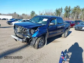 2014 Toyota Tacoma with VIN 3TMLU4EN5EM140028, listed as a IAAI auction lot 40965372 with 94,372 mi miles and . Bid and sale history available at DreamBid. Image 18.