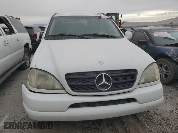 2000 Mercedes-Benz M-Class with VIN 4JGAB54E2YA170332, listed as a Copart auction lot 73206804 with 121,910 mi miles and Non Repairable. Bid and sale history available at carsss.com. Image 5.