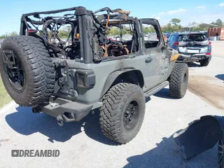 2020 Jeep Wrangler Sport S with VIN 1C4GJXAG6LW189187, listed as a IAAI auction lot 40280437 with Not provided miles and . Bid and sale history available at DreamBid. Image 4.