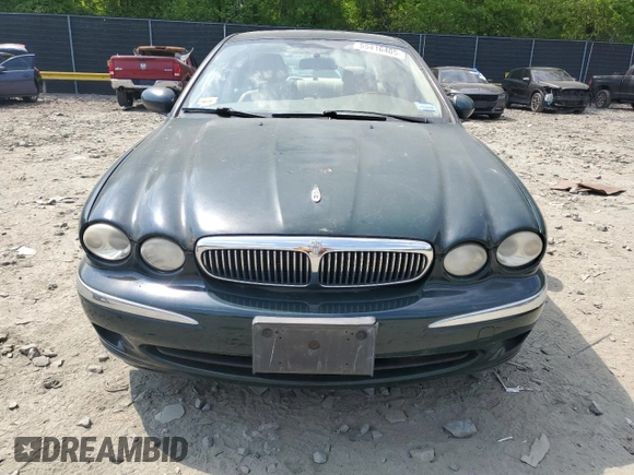 2004 Jaguar X-Type with VIN SAJEA51C64WE17722, listed as a Copart auction lot 55416405 with 89,047 mi miles and Salvage Title. Bid and sale history available at DreamBid. Image 5.