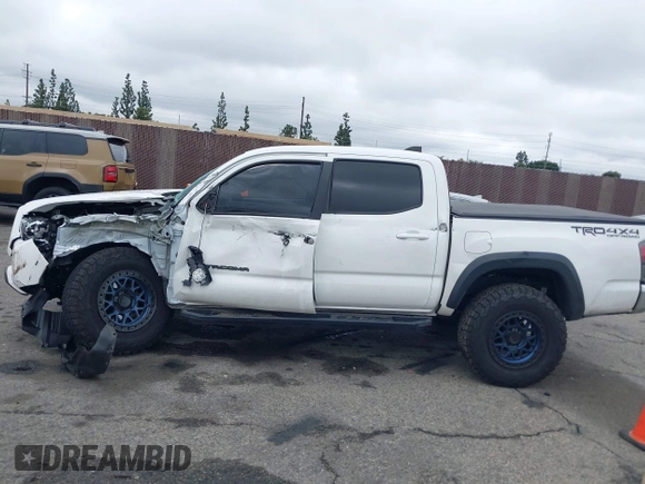 2023 Toyota Tacoma 4WD SR with VIN 3TMCZ5AN0PM550641, listed as a IAAI auction lot 41929355 with 18,917 mi miles. Bid and sale history available at carsss.com. Image 14.