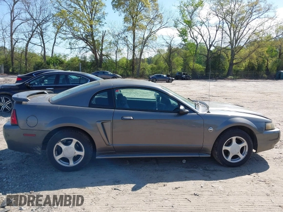 2004 Ford Mustang Standard z VIN 1FAFP40644F236905, wystawiony jako IAAI lot #42016081 z przebiegiem 167 733 mil mil oraz . Historia ofert i sprzedaży dostępna na DreamBid. Obrazek 13.