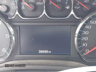 2016 Chevrolet Tahoe LS z VIN 1GNSCAEC8GR387676, wystawiony jako IAAI lot #41774142 z przebiegiem 36 695 mil mil oraz . Historia ofert i sprzedaży dostępna na DreamBid. Obrazek 16.