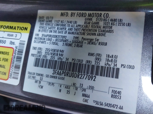 2013 Ford Fusion Titanium Hybrid with VIN 3FA6P0RU0DR277092, listed as a IAAI auction lot 41811079 with 123,071 mi miles. Bid and sale history available at carsss.com. Image 9.