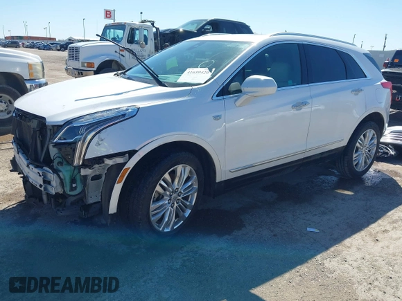 2017 Cadillac XT5 Premium Luxury FWD z VIN 1GYKNCRS9HZ106397, wystawiony jako IAAI lot #41659420 z przebiegiem 54 615 mil mil oraz . Historia ofert i sprzedaży dostępna na DreamBid. Obrazek 2.