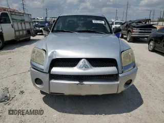 2007 Mitsubishi Raider LS z VIN 1Z7HC28KX7S126249, wystawiony jako Copart lot #63955484 z przebiegiem 176 786 mil mil oraz Szkoda całkowita • Salvage title. Historia ofert i sprzedaży dostępna na DreamBid. Obrazek 5.