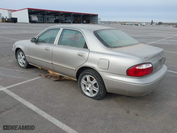 2002 Mazda 626 LX with VIN 1YVGF22DX25263864, listed as a IAAI auction lot 41846129 with 282,516 mi miles. Bid and sale history available at carsss.com. Image 3.