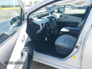 2021 Toyota Prius LE with VIN JTDKAMFP2M3177459, listed as a IAAI auction lot 42093828 with 65,501 mi miles and . Bid and sale history available at DreamBid. Image 5.