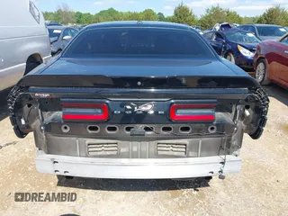 2019 Dodge Challenger SXT z VIN 2C3CDZAG5KH561606, wystawiony jako IAAI lot #41994950 z przebiegiem 97 615 mil mil oraz . Historia ofert i sprzedaży dostępna na DreamBid. Obrazek 17.