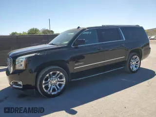 2015 GMC Yukon XL Denali with VIN 1GKS1JKJXFR298440, listed as a Copart auction lot 49632855 with 94,310 mi miles and Salvage Title. Bid and sale history available at carsss.com. Image 1.