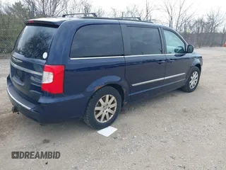 2013 Chrysler Town & Country Touring with VIN 2C4RC1BG2DR598182, listed as a IAAI auction lot 42026752 with 228,792 mi miles. Bid and sale history available at carsss.com. Image 4.