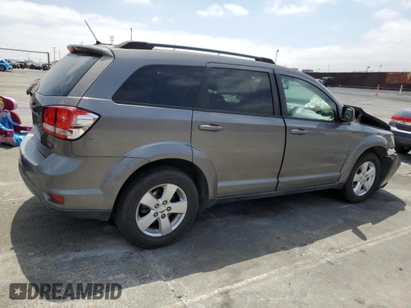2012 Dodge Journey SXT with VIN 3C4PDCBG6CT207952, listed as a Copart auction lot 60334565 with Not provided miles and Salvage title. Bid and sale history available at DreamBid. Image 3.