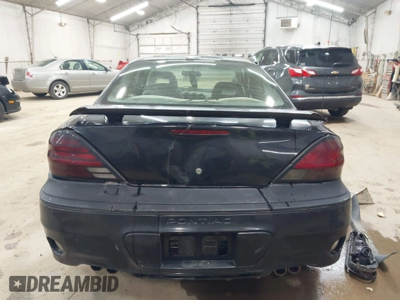 2005 Pontiac Grand Am GT with VIN 1G2NW12E85M140434, listed as a IAAI auction lot 41966294 with 142,548 mi miles. Bid and sale history available at carsss.com. Image 16.