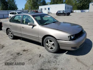 1998 Toyota Avalon XL with VIN 4T1BF18BXWU228989, listed as a Copart auction lot 53821495 with 157,209 mi miles and Salvage Title. Bid and sale history available at DreamBid. Image 4.