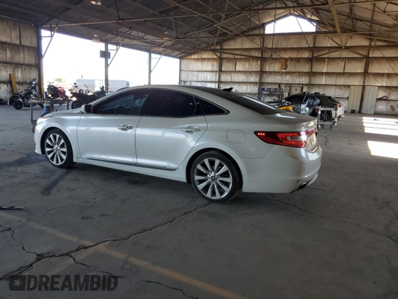 2015 Hyundai Azera Limited с VIN KMHFH4JG2FA477162, выставлен на аукционе Copart как лот 61684235 с пробегом 153 524 миль миль и Списание • Salvage title. История ставок и продаж доступна на DreamBid. Изображение 2.