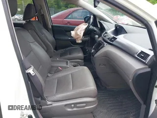 2015 Honda Odyssey EX-L z VIN 5FNRL5H61FB107735, wystawiony jako IAAI lot #42255001 z przebiegiem 170 825 mil mil oraz . Historia ofert i sprzedaży dostępna na DreamBid. Obrazek 5.