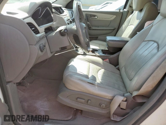 2014 Chevrolet Traverse LTZ with VIN 1GNKRJKD3EJ329725, listed as a Copart auction lot 53272755 with 221,219 mi miles and Salvage Title. Bid and sale history available at DreamBid. Image 7.