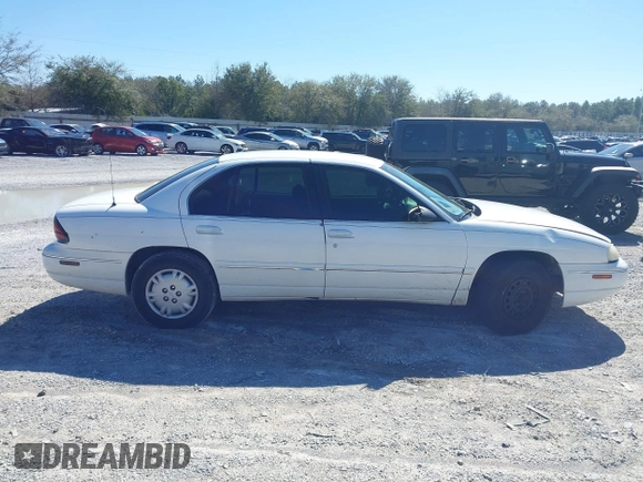 1998 Chevrolet Lumina with VIN 2G1WL52M9W9118618, listed as a IAAI auction lot 41582985 with 105,833 mi miles and . Bid and sale history available at DreamBid. Image 12.