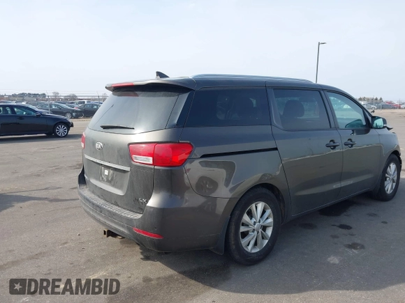2017 Kia Sedona LX with VIN KNDMB5C19H6329933, listed as a IAAI auction lot 41796158 with 101,399 mi miles. Bid and sale history available at carsss.com. Image 4.
