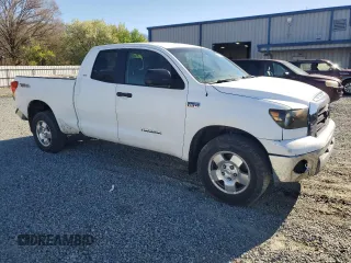 2009 Toyota Tundra 4WD Truck with VIN 5TFBW54149X087574, listed as a Copart auction lot 49273235 with 229,401 mi miles and Salvage Title. Bid and sale history available at carsss.com. Image 4.
