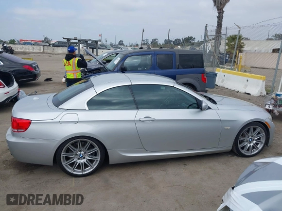 2010 BMW 3 Series 335i with VIN WBAWL7C53AP474127, listed as a IAAI auction lot 41871518 with 111,136 mi miles. Bid and sale history available at carsss.com. Image 13.