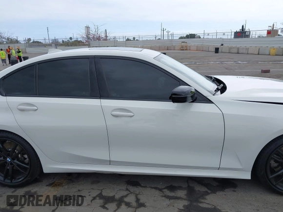 2021 BMW 3 Series 330i z VIN 3MW5R1J04M8C06043, wystawiony jako IAAI lot #42109872 z przebiegiem 62 325 mil mil oraz . Historia ofert i sprzedaży dostępna na DreamBid. Obrazek 13.
