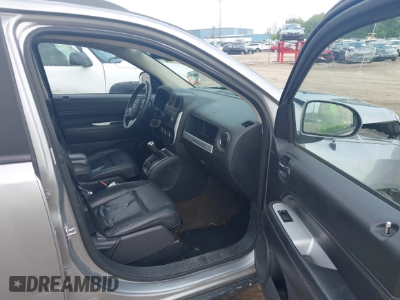 2016 Jeep Compass High Altitude with VIN 1C4NJDEBXGD730764, listed as a IAAI auction lot 42371491 with 125,302 mi miles and . Bid and sale history available at DreamBid. Image 5.