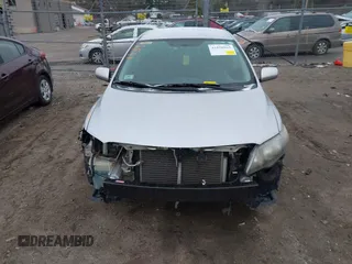 2010 Toyota Corolla with VIN 2T1BU4EE4AC454655, listed as a IAAI auction lot 41858963 with 209,816 mi miles. Bid and sale history available at carsss.com. Image 12.