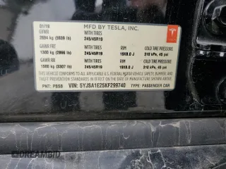 2019 Tesla Model S 75D with VIN 5YJSA1E25KF299740, listed as a Copart auction lot 55821595 with 140,385 mi miles and Salvage title. Bid and sale history available at DreamBid. Image 12.