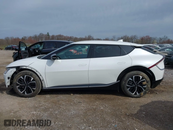 2022 Kia EV6 Wind z VIN KNDC3DLC5N5039405, wystawiony jako IAAI lot #41937250 z przebiegiem 55 659 mil mil oraz . Historia ofert i sprzedaży dostępna na DreamBid. Obrazek 14.