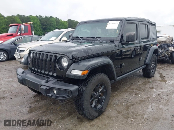2021 Jeep Wrangler Unlimited Sport S with VIN 1C4HJXDN0MW678801, listed as a IAAI auction lot 42211815 with 96,849 mi miles and . Bid and sale history available at DreamBid. Image 2.