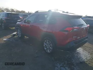 2021 Toyota RAV4 XLE Premium with VIN 2T3C1RFV1MW145048, listed as a IAAI auction lot 41018272 with 61,959 mi miles and . Bid and sale history available at DreamBid. Image 3.