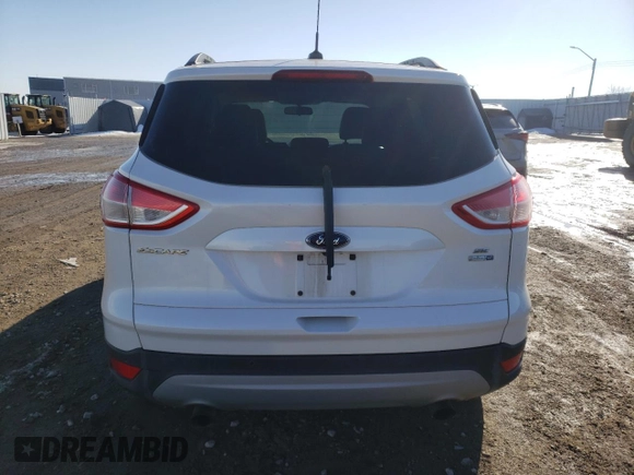 2014 Ford Escape SE z VIN 1FMCU9G9XEUB66869, wystawiony jako Copart lot #59546115 z przebiegiem 224 021 mil mil oraz Szkoda całkowita • Salvage title. Historia ofert i sprzedaży dostępna na DreamBid. Obrazek 6.