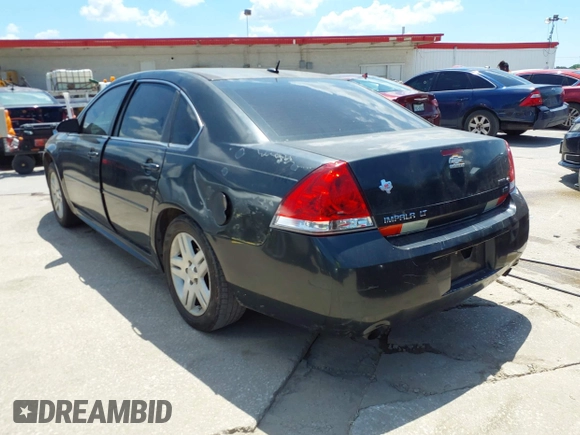 2014 Chevrolet Impala LT with VIN 2G1WB5E31E1106255, listed as a IAAI auction lot 41960424 with 235,070 mi miles and . Bid and sale history available at DreamBid. Image 3.