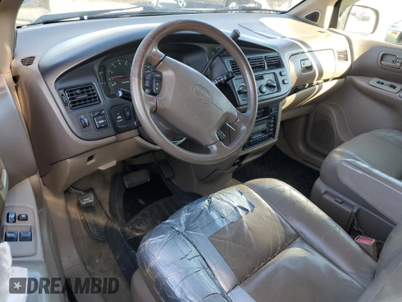 1999 Toyota Sienna LE with VIN 4T3ZF13C5XU144781, listed as a Copart auction lot 48932535 with 216,436 mi miles and Salvage Title. Bid and sale history available at carsss.com. Image 8.