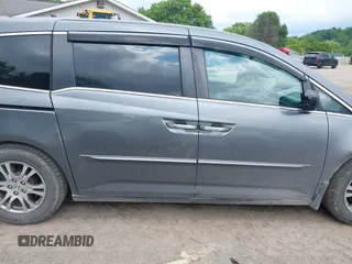 2012 Honda Odyssey EX z VIN 5FNRL5H45CB084342, wystawiony jako IAAI lot #42329303 z przebiegiem 173 711 mil mil oraz . Historia ofert i sprzedaży dostępna na DreamBid. Obrazek 13.