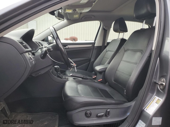 2014 Volkswagen Passat SE with VIN 1VWBP7A38EC018710, listed as a Copart auction lot 42289915 with 100,595 mi miles and Salvage Title. Bid and sale history available at carsss.com. Image 7.