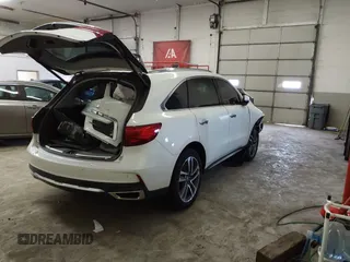 2018 Acura MDX Advance with VIN 5J8YD4H89JL000217, listed as a IAAI auction lot 41614726 with 89,286 mi miles and . Bid and sale history available at carsss.com. Image 4.