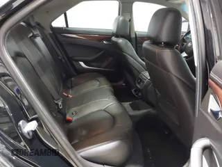 2013 Cadillac CTS Premium z VIN 1G6DS5E34D0103328, wystawiony jako IAAI lot #41501406 z przebiegiem 157 633 mil mil oraz . Historia ofert i sprzedaży dostępna na DreamBid. Obrazek 8.
