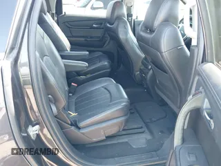 2016 Chevrolet Traverse LTZ z VIN 1GNKRJKD1GJ301277, wystawiony jako IAAI lot #41884629 z przebiegiem 106 338 mil mil oraz . Historia ofert i sprzedaży dostępna na DreamBid. Obrazek 8.
