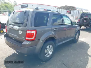 2011 Ford Escape Limited with VIN 1FMCU9EG2BKC55005, listed as a IAAI auction lot 41958212 with 188,182 mi miles. Bid and sale history available at carsss.com. Image 4.
