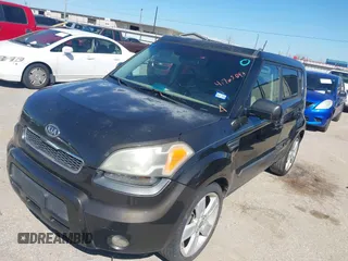 2011 Kia Soul + with VIN KNDJT2A22B7243696, listed as a IAAI auction lot 41762093 with 195,696 mi miles. Bid and sale history available at carsss.com. Image 2.