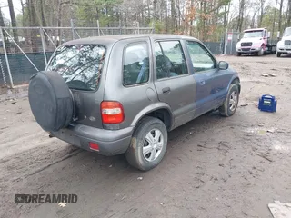2001 Kia Sportage with VIN KNDJB723515095478, listed as a IAAI auction lot 41823976 with 185,652 mi miles. Bid and sale history available at carsss.com. Image 4.