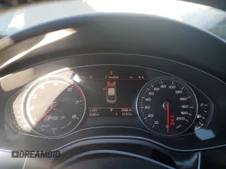 2017 Audi RS 7 Prestige z VIN WUAWAAFC8HN903853, wystawiony jako Copart lot #86112964 z przebiegiem 57 313 mil mil oraz Szkody całkowita. Historia ofert i sprzedaży dostępna na DreamBid. Obrazek 9.