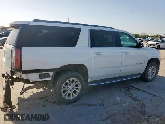 2019 GMC Yukon XL SLT with VIN 1GKS2GKC5KR363643, listed as a Copart auction lot 52749525 with 92,872 mi miles and Salvage title. Bid and sale history available at DreamBid. Image 3.
