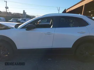 2021 Mazda CX-30 Premium with VIN 3MVDMBDY2MM236118, listed as a IAAI auction lot 41182309 with 32,286 mi miles and . Bid and sale history available at carsss.com. Image 13.